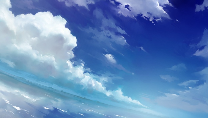 Blue sky with white clouds over the sea