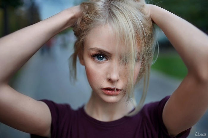 Woman with blonde hair and blue eyes