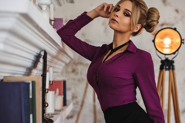 Woman in purple shirt by Artem SolovЬev
