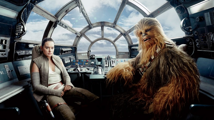Rey and Chewbacca in the Millennium Falcon cockpit