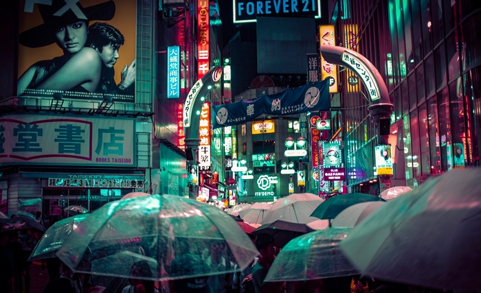 Shibuya Crossing at Night with Umbrellas