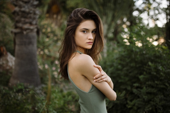 Woman in a green dress outdoors
