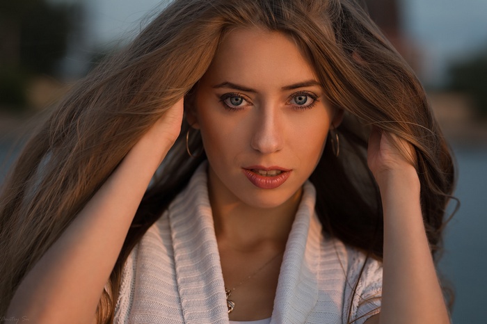Woman with long hair and blue eyes
