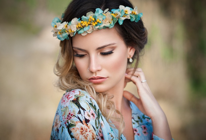 Woman with flower crown and floral dress