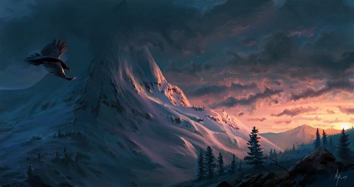 Bird flying over snow-covered mountains at sunset