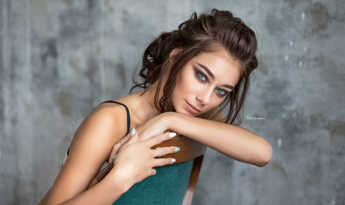 Portrait of a woman with blue eyes by Maksim Romanov