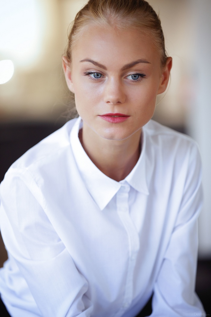 Nancy A in a white shirt