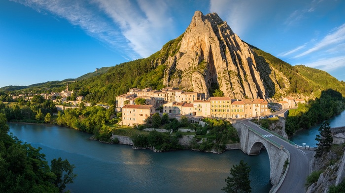 Sisteron, France: Town nestled by a river and mountain