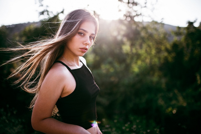 Woman with windblown hair outdoors