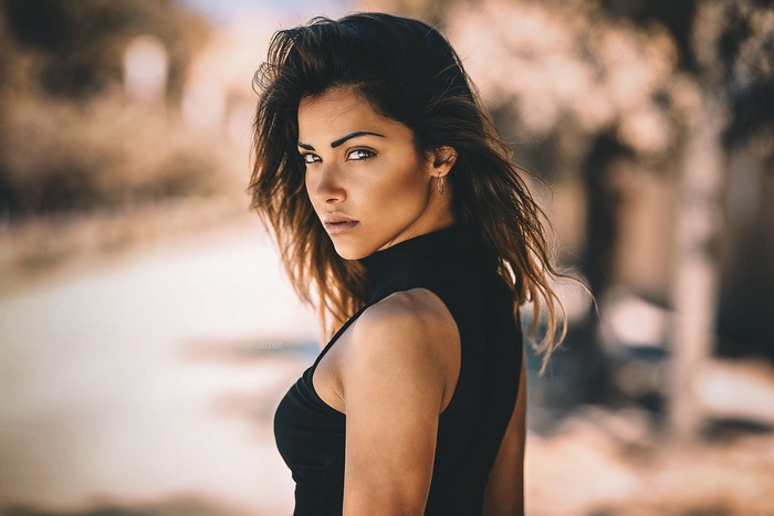 Woman in black clothing outdoors