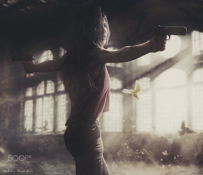 Woman with two guns in abandoned building