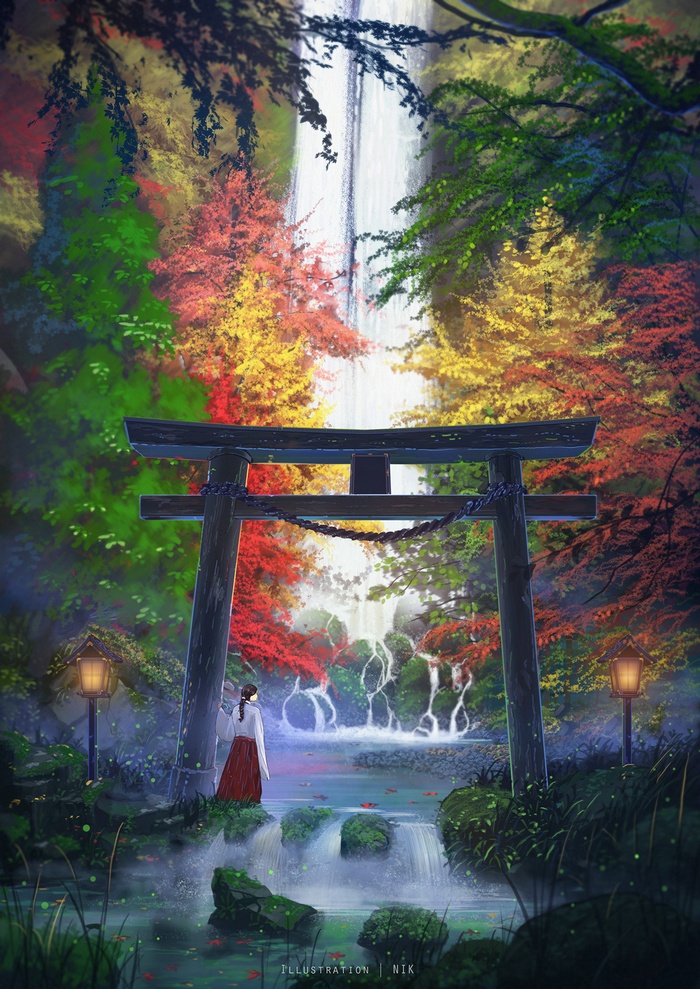 Woman in traditional Japanese clothing at a waterfall shrine