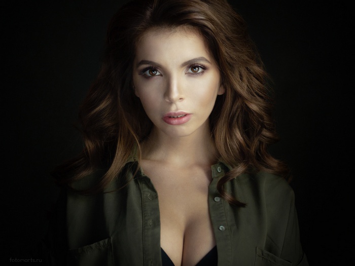 Karina Avakian portrait in a green shirt