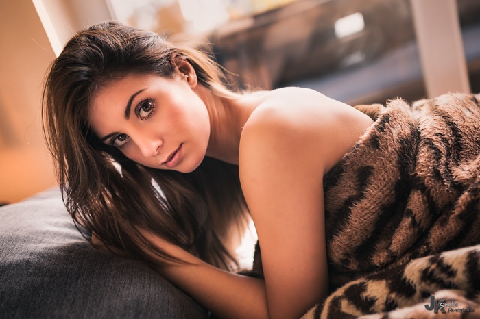 Woman wrapped in a blanket, portrait
