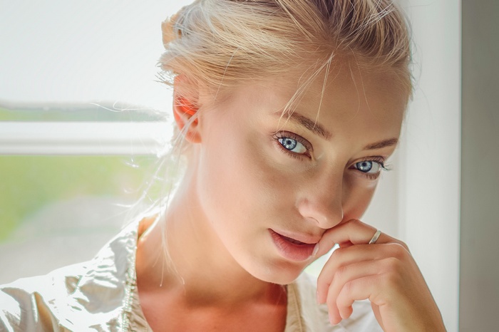 Anna Loannova with finger on lips