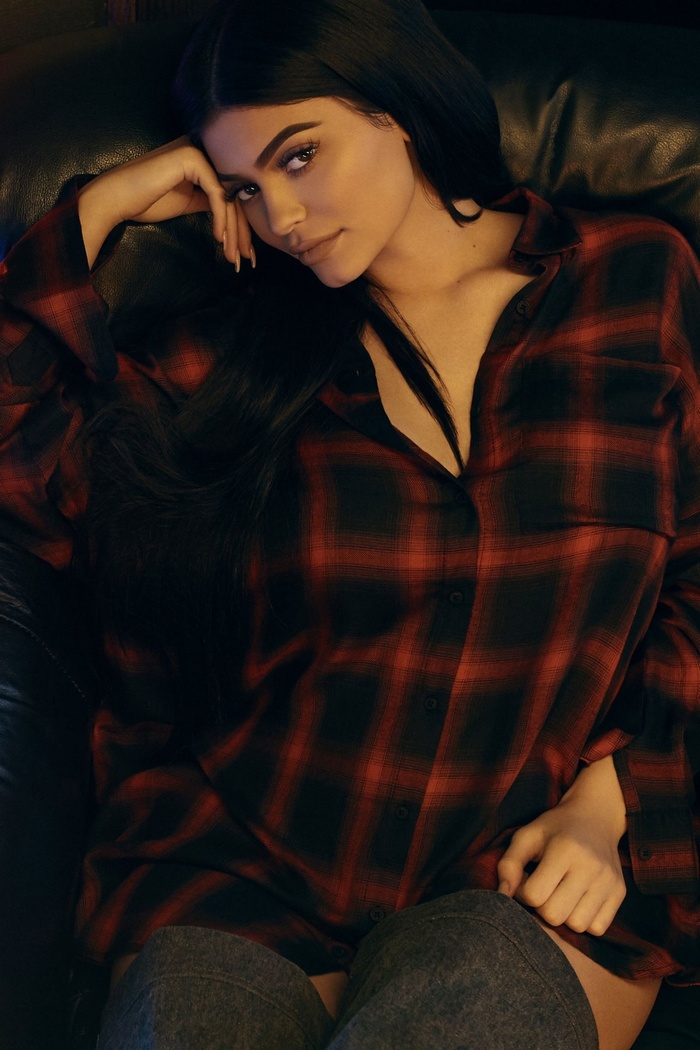Kylie Jenner wearing a red and black plaid shirt