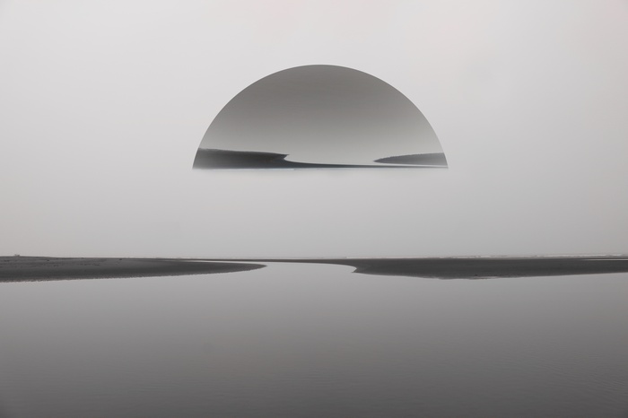 Monochrome landscape with reflection and semi-circle overlay