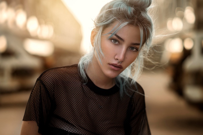 Woman with blue dyed hair and nose ring