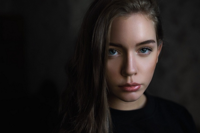 Portrait of a young woman with blue eyes