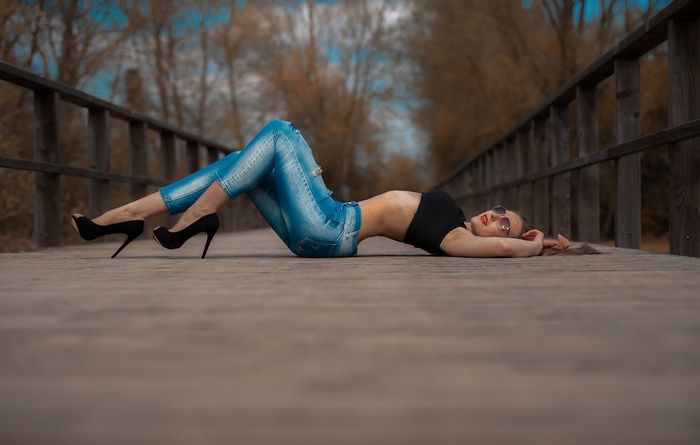 jeans, arched back, women outdoors, women, on the floor, depth of field, torn jeans, closed eyes, lying on back, sunglasses, armpits, red lipstick, tanned