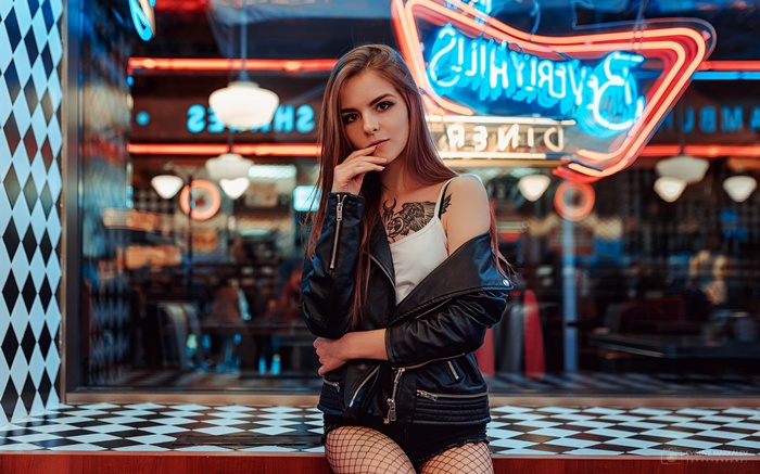 Vasilisa Sarovskaya with tattoo and fishnet stockings