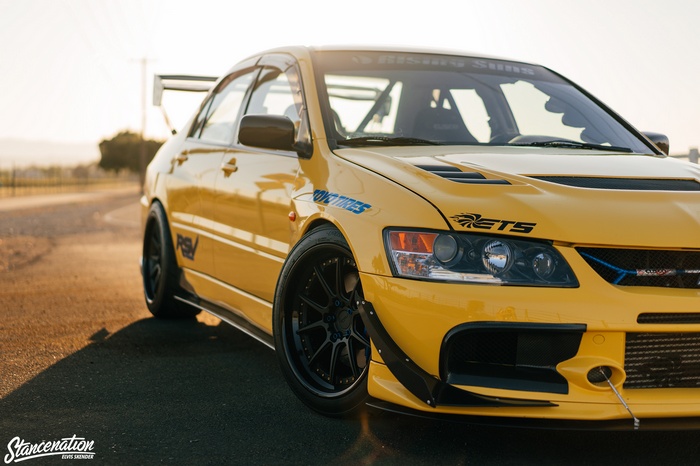 Yellow Mitsubishi Lancer Evolution VIII with StanceNation livery