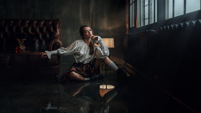Anastasia Zonova in a white shirt and skirt
