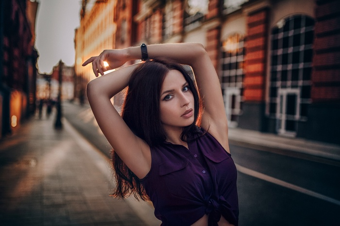 Alina Starostina posing outdoors during sunset