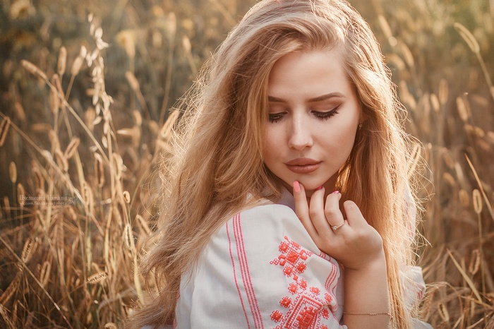 Portrait of a woman in a field