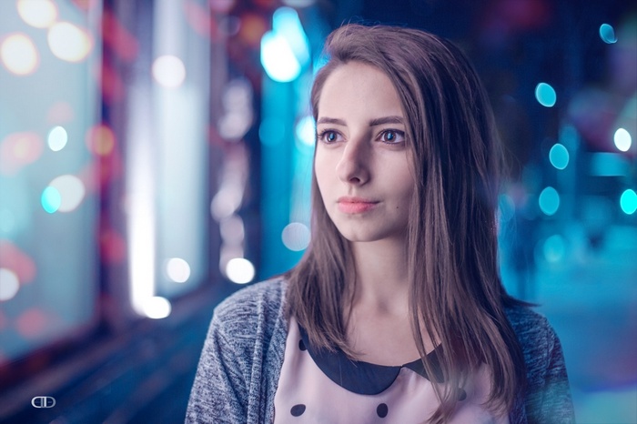 Portrait of a young woman with brown eyes and brunette hair