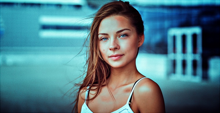 Portrait of a young woman with blue eyes