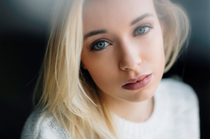 Portrait of a blonde woman with blue eyes