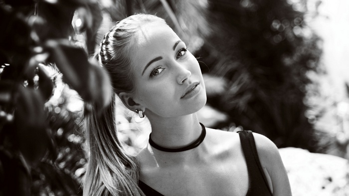Monochrome portrait of a woman with a ponytail