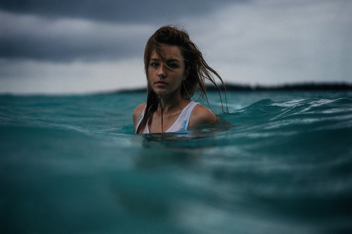 Woman swimming in the ocean