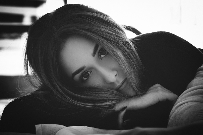 Monochrome portrait of a woman looking at the viewer
