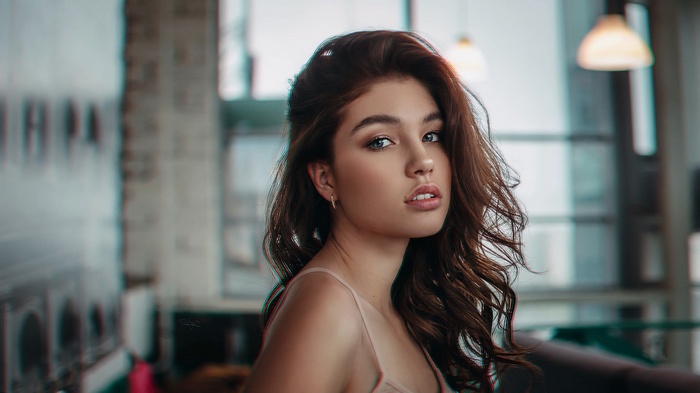 Portrait of a young woman with brown hair