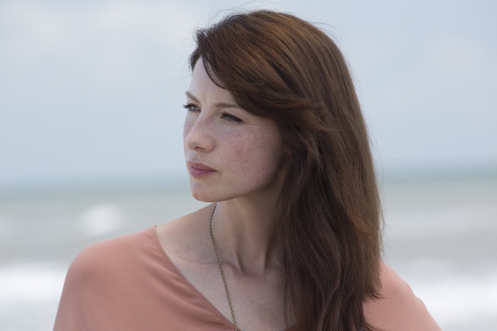 Caitriona Balfe with freckles by the sea