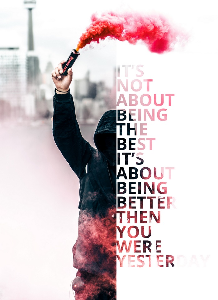 Person holding smoke grenade with inspirational quote