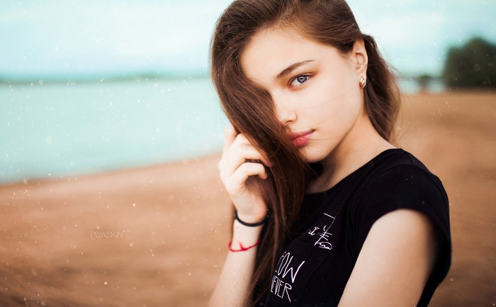 Portrait of a young woman on a beach