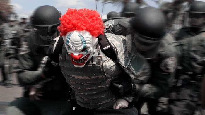 Clown mask wearer detained by police