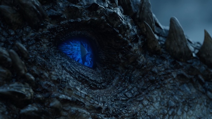 Close-up of a dragon's blue eye from Game of Thrones