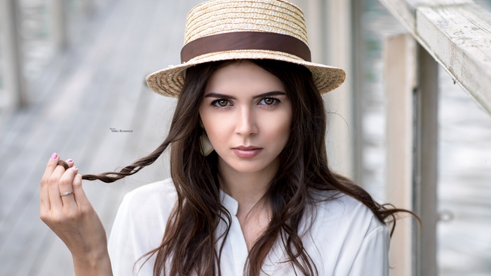 Woman wearing a straw hat, Maksim Romanov