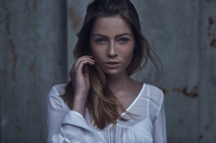 Portrait of a woman with freckles