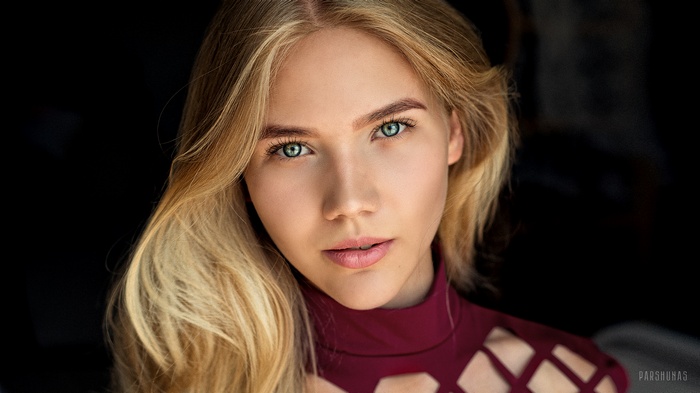 Woman with blonde hair by Anton Parshunas