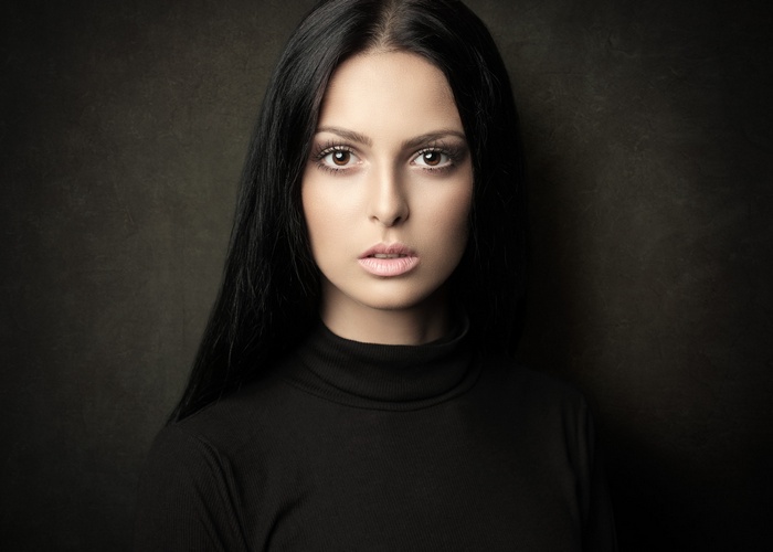 Woman in black turtleneck