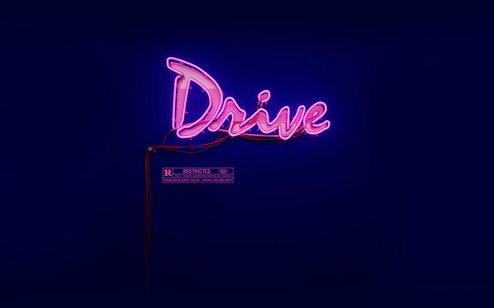 Drive neon sign with R rating