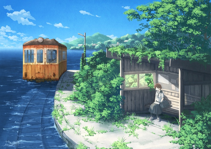 Girl in JK uniform at a train station by the water