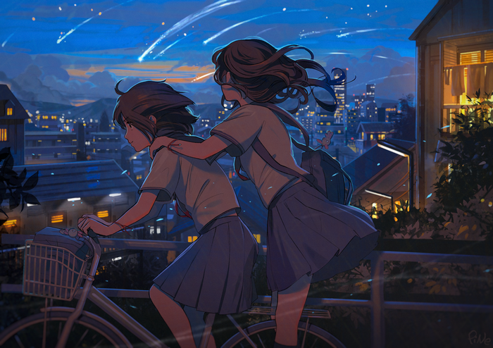 Two Japanese schoolgirls on a bicycle at night