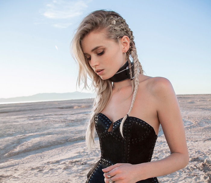 Woman with braids in a desert
