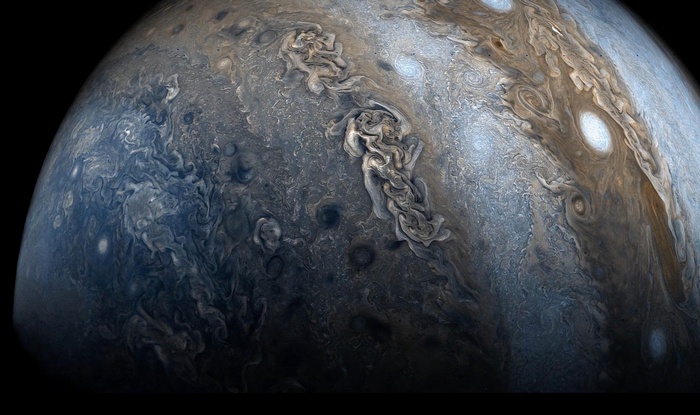 Jupiter's turbulent atmosphere with swirling storms